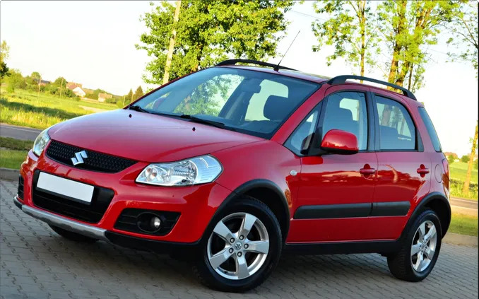 samochody osobowe Suzuki SX4 cena 31900 przebieg: 93865, rok produkcji 2013 z Piastów